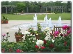 Fountain Garden and Covert Gazebo, Klehm Arboretum and Botanic Garden, Rockford — The Covert Gazebo is a beautiful setting for any type of wedding ceremony, large or small. The trellis area is covered in lovely climbing roses during the month of June. July and August bring a symphony of flowers in the beds planted around the Fountain Garden area. The burbling water of the fountain provides a calm, relaxing atmosphere. A picnic grove is located just to the west of the garden.
