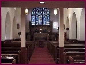 The beautiful 1896 nave with the largest collection of stained glass in Harford County.