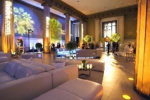Broad Street Ballroom, Broad Street Ballroom, New York — The Ballroom features an open, 5,700 square foot space, adorned with 30-foot mosaic pillars and a state-of-the-art, Broadway-quality audio/visual system, complete with a 22' x 22' roll-down projection screen. 

For a banquet setting, the space can provide accommodations for up to 300 guests comfortably; an auditorium setting will have room for up to 500 guests, and a cocktail setting will accommodate up to 630 guests.