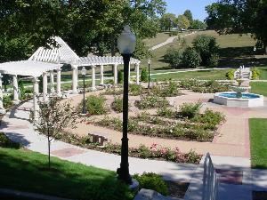 Rose Garden, Sioux City — The Rose Garden is perfect for a small outdoor wedding complete with a fountain, trellis, and plenty of roses.