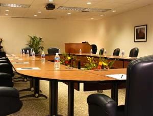 Executive Boardroom, Qwest Learning & Conference Center, Denver — Designed with success in mind, the Executive Board Room offers you advanced technology, a mini-business center and is supported by an on-site specialist to ensure well executed meetings.