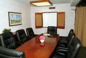 Jayhawk Room, Crowne Plaza Kansas City - Overland Park, Lenexa — Our Jayhawk boardroom is perfect for executive and small group meetings. It seats up to (8) people.
