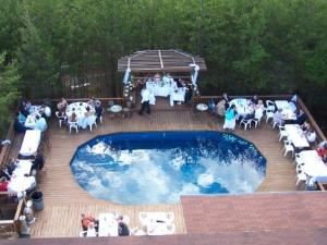 Blue Lagoon Deck, Cavender Castle, Dahlonega — The Blue Lagoon is a lovely, private outdoor deck complete with a fountain.  Perfect for receptions and private parties.  A bar or buffet can be set up under the awning.