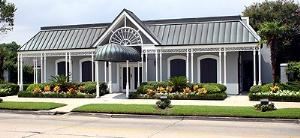 Grand Ballroom, Magnolia Plantation, New Orleans — Magnolia Plantation will make your special day a truly memorable and successful event. Our 15,000 square foot facility, located in the heart of Elmwood servicing Metairie, New Orleans, and the surrounding areas, is able to accommodate groups of 100-1200 guests. Our 1200 square foot dance floor and experienced DJ will have your guests “dancing the night away”. Crystal chandeliers, white linens and chair covers, and glowing candle centerpieces provide a romantic and elegant setting for this most important affair.

Our specialized services have been developed in response to the needs and ideas of our clients. Our staff provides expertise and special attention to help you plan and host your next elegant party, wedding, or reception.