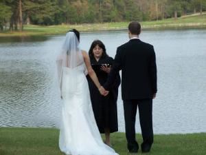 Performing a romantic lakeside wedding.