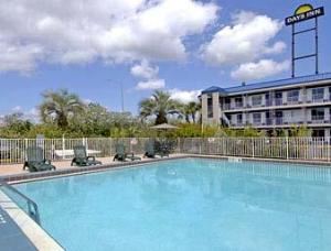 Days Inn North Of Busch Gardens, Tampa — Olympic Size Outdoor Pool - If relaxation is on your mind, why not spend an afternoon by our large outdoor swimming pool and sun deck area, and soak up some of our Florida sunshine!
