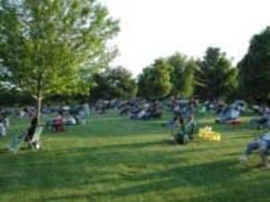 Packard Amphitheater, Dubuque Arboretum and Botanical Garden @ Marshall Park, Dubuque — Spectators enjoy a musical performance on the grounds surrounding the Amphitheater.