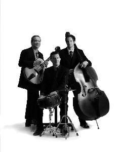 Luxury Trio, Houston — Old-school jazz trio that plays instrumental versions of the classics by Ellington, Sinatra and Jobim as well as jazzed-up versions of Elvis the Beatles and current pop tunes. Performers play arch-top guitar, upright bass and drums. Perfect for upscale events including weddings, and corporate parties.