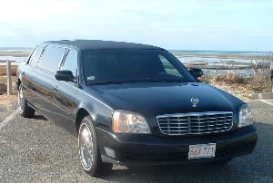 Limousine Services of Cape Cod, Brewster — We are a limousine company that focuses on our clients by providing a V.I.P. service.  Our service is of top quality, while keeping in mind the little details that help to make their ride enjoyable. Bite size snacks. Tic tacs. 8 Ounce serving size of bottle water, soda or juice on ice. Fine white tulle with small silk flowers that gives an added touch for weddings. The white carpet for weddings and the red carpet for the celebrity style. Opening the doors to holding the umbrella when needed. We offer a pearl white Cadillac Sedan, black 6 passenger Cadillac limouisne, and a black Lincoln Navigator SUV.
