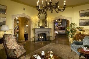 Wilkes Room, The Henley Park Hotel, Washington — A Traditional Drawing rooom, Formal Tea is served by reservation.  Perfect for Bridal Showers, Wedding Receptions and stand up cocktail parties.  Gas Fireplace.