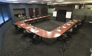 Board Room, Lake Ridge Pointe Venue & Conference Center, Willowbrook — 1063 Sq.Ft. 
Wireless Internet Connectivity; Remote/Recessed Ceiling Projection Screen, Polycom SoundStation phone/high fidelity voice.

Seats 20 comfortably - ergonomic executive leather chairs
Two adjoining caucus rooms - seats six per room

(4) Floor Telephone/data/electrial outlets
(2) Duplex Outlets 

Custom fabricated bar with silestone coutertop and stainless bar sink, Custom silestone curved counter/window sill
