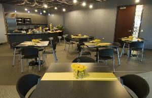 Retro Break-Room/Martini Themed Bar, Lake Ridge Pointe Venue & Conference Center, Willowbrook — Retro Break Room/Martini Themed Bar – 848 square feet
Equipped with wireless internet, Curved black marble counter with stools, Exterior balcony – 273 square feet

Available Mon -thru Fri Only.