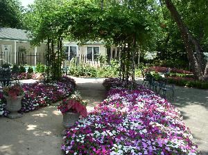 Van Gogh Bar and Lounge, The Sanford House Inn & Spa, Arlington — Lush flowers surround the stone courtyard with it's raised pavilion and octagonal gazebo.  Perfect for outdoor weddings and events