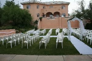 Las Candelas, Tucson — Las Candelas has a wonderful reataurant on the premisis. The Bistro is a delicious way to cater your event for any occasion. Our menus are very affordable and creative. Have your ceremony in our beautiful, lush green garden area. Your guests will enjoy the serenity of our location. Our ballroom is perfect for your intimate reception. It holds up to 200 guests and has a patio facing a lush green park area. Enjoy having the location all to yourselves. Call us at (520) 818-1305 or 977-4386 for pricing or visit our website at www.lascandelas.com