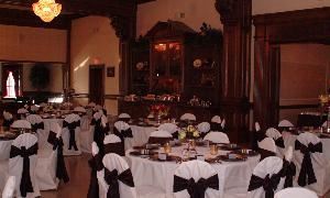 Grande Ballroom, Dominion House, Guthrie — The Grande Ballroom is a beautiful setting for an elegant reception with its 15' ceilings, crystal chandeliers, intricate woodwork, and rich velvet draperies.