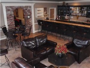 Bentley Room, Park Crest Event Facility, Birmingham — This is our most popular room. It has brand new ceramic tile and a beautiful bar area, 3 flat screen HD T.V.s, surround sound system with 400 disc c.d/dvd player. Gorgeous leather furniture and can accommodate up to 50 people in a reception type setting or 36 seated.