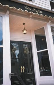 Chez Lafitte, Easton — Chez Lafitte - French Late Night - Historic Easton. Open Friday and Saturday evenings from 6pm - 1am... Always available by appointment for private dinner and dance parties, wedding and corporate events.  This distinguished Easton Late night staple is now celebrating it's sixth year in business catering to discerning local and weekender patrons. The boutique restaurant is located in an enchanting pink 1910 structure and is entree to the heart of downtown. The small jewel with ample indoor and outdoor seating includes three sumptuous dining rooms with velvet banquets and draperies, a player piano, oil paintings, (a sexy leapard room for lingering) and surround sound, each setting the stage for a memorable night on the town! New York Magazine, Traditional Home, Travel Savvy, Chesapeake Life, Women's View and Frommers. Owner is the author of the Jean Lafitte International travel guides for chien (dogs) and their owners.