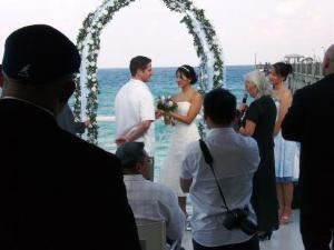 Beach Watch, Dania — Perfect Place for beach weddings, shown a ceremony on site.