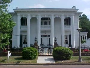 Shadowlawn, ca 1848 Looking for that perfect place for your Wedding? Consider historic Shadowlawn in the beautiful Columbus Historic District. Our Greek Revival Mansion was totally restored in 2001 and is now available for Weddings and Receptions, Rehearsals, Bridesmaids Luncheons, even to the Honeymoon night in the Bed & Breakfast and everything in between... Call for an appointment to see all we have to offer today's special Bride and Groom... We offer a complete wedding service, from the venue, to the flowers, to the catering, to the cake, to the directing and planning...You will be surprised to see how affordable it can be! For the modest wedding to the wedding that is "over the top," Shadowlawn is the place to be. Shadowlawn is Christian Owned and Operated. "Do not hesitate to show hospitality to strangers, for thereby some have entertained angels unawares." Hebrews 13:2
