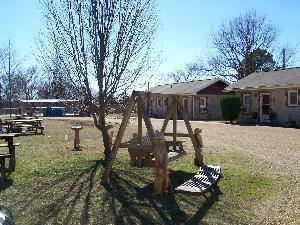 Stone cabins, 1 or 2 bedrooms, full kitchens, private bath, large pool, flat parking, large picnic grounds, games, free popcorn, fire pit with wood provided. Very clean rooms, many with queen beds. Air conditioning or heat if needed. 
A family friendly place. Pets are welcome.