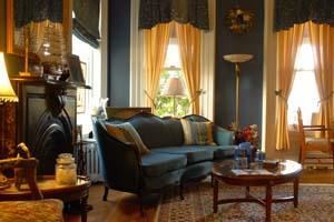 Parlor, Bricktown Inn, Haverstraw — Our lovely royal blue parlor is a regal place to relax and read or listen to the lovely player piano.