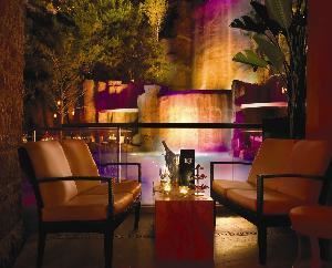 Tryst Nightclub, Las Vegas — Celebrate your next special event at Tryst located inside Wynn Las Vegas.  Nestled inside Steve Wynn’s landmark signature resort, this sophisticated and epic nightspot has a breathtaking outdoor patio that faces a 90 foot cascading waterfall.

Tryst’s 12,000-square-foot space exudes sensuality from the intimate entrance lounge to the terraced outdoor lagoon, as well as the hideaway VIP library decorated in rich cherry reds.

The interior seats 650 and surrounds a sunken dance floor, while the club’s outdoor covered patio seats an additional 450 guests around the private lagoon.
