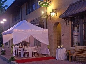 Our venue has two levels which can be rented separately or together.  A 1000 sq ft classically styled banquet room on the lower level and 1200 sq ft of furnished reception areas, including a billiards room on the upper level.  Each level is equipped with ipod compatible sound systems and two restrooms.  We also offer an optional tent which can be added to the sidewalk.  We welcome any licensed caterer.  TheTownHouseatMtLaurel.com