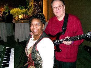 THE ANTONELLI DUO-SHASHANA & ROLANDO-KEYBOARDS/SYNTH & GUITAR--"THE SOUND OF 4--THE PRICE OF 2", Richmond — THE ANTONELLI DUO--SHASHANA & ROLANDO--performing their beautiful SOOTHING, SMOOTH JAZZ GARDEN MUSIC at the private party for special contributors to the Maymont Foundation at the Richmond Convention Center, Richmond, VA, February, 2008.