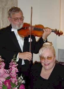 Ekstedt Entertainment was founded in 1999.  In the years following many of the finest professional musicians available have joined our musical family.  These are all professional musicians who work in major Symphonies and Orchestras.  Our groups convey an ambiance of elegance at any wedding or social event where they perform.  It is our goal to bring the finest musicians available to your event.  We hold ourselves to the strictest level of excellence from our professional attire, Black Tie Tuxedo or our ladies in tasteful concert black, to arriving one half hour early at events to set up and be prepared to perform at the contracted time.  We offer the famous Seattle String Quartet, Trios, Duos, Soloists, and Jazz ensembles, comprising the finest musicians in the Pacific Northwest.  All musicians covered by L&I Insurance.  VISA/MC accepted. We ask a $100 deposit at the time of signing the contract and the balance is due about 30 days prior to the event.