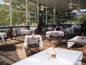 River Inn Events Center, Chattanooga — The upper deck is screened and covered which is ideal for outside festivities.  This deck can accommodate 115 for a sit down diner.