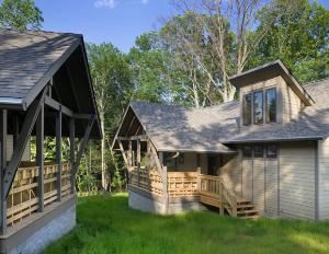 15 Cabins, Joe C. Davis Outdoor Center, Antioch — Each cabin will sleep up to 15 guests.  Restrooms and shower facilities are located in each cabin.  A covered front porch and a covered back deck overlooking the lake make this the perfect location for your retreat!