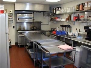 Kitchen, First Unitarian Universalist Society of Albany, Albany — An up to date, fully functional food preparation center is available, consisting of a 6 burner gas stove, industrial dishwasher and stainless tables.