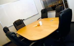 Medium Conference Room, Sandbox Suites, San Francisco — Accomodates up to 8 people. Comes with wi-fi, projector, conference phone, beverage service.