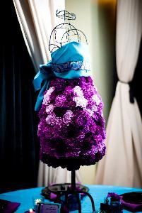 Flora Design Studio, Alpharetta — This was for a Sweet 16 Fashion themed birthday party. I was inspired by a Pucci scarf that I have.  The entire bottom form of the mannequinn is made of flowers in a spiral pattern.