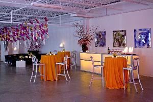Banchet Flowers, Stamford — An industrial space with an antique brick wall that is filled with beautiful fresh flower and plant displays.  Our CT space is larger and more open than our NYC venue, which is located at 809 Washington St. in the meatpacking district.  Banchet Flowers is a full service florist that uses the freshest product.  Our flowers are flown in from Holland, Thailand and the Americas.  We try to incorporate orchids into all of our arrangements, as they are part of our signature look.  Please feel free to visit our website www.banchetflowers.com for pictures and other information.