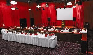 The Showroom, Dave & Buster's, Broomfield — This private, theater-style, split-level room with dramatic floor-to-ceiling drapes comes complete 
with complimentary use of our audiovisual equipment.
LCD projector, 9’ x 12’ built-in screen, stage, podium, microphones and more! 
This is a wonderful space for a celebration, presentation or a buffet dinner with seating from 50 to 125 Guests. 200 reception style/ theatre seating