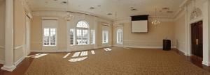 Berlin Room, Saint Paul's Church, Augusta — The Berlin Room is a 1,074 square-foot meeting room/reception hall with views of Augusta's Riverwalk and the rose garden at Saint Paul's Church.  

    * 1,074 sq. ft. total event area
    * Rectangular in shape
    * Capacity for reception or theatre seating - 108
    * Capacity for seated banquet - 72
    * Room Dimensions - 30’ x 35’
    * State of the art audio/visual equipment

The room includes a projector and screen for presentations (presentation computer not provided).  The windows have retractable shades to limit sunlight during presentations.  A commercial-grade kitchen is available for use with an additional fee.