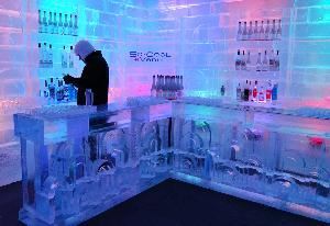 So Cool eVenue, So Cool Evenue, Miami — The So Cool eVenue includes a 1,000 square foot ice lounge. This room is maintained at -5 degrees Celsius and is made completely of ice. Led lighting illuminates the walls of ice, ice chandeliers, an ice bar, ice tables and ice chairs. Guests are provided with fur lined hooded capes and Croc Shoes to keep them warm during the ice lounge experience.