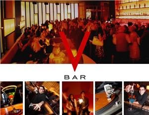 V Bar, Ark Vegas, Las Vegas — V BAR AT THE VENETIAN RESORT HOTEL CASINO

Twice voted "Best Hotel Bar" by the readers of City Search, and known to celebrities and martini aficionados around the globe, V Bar is recognized as the first ultra lounge in Vegas.

Created by the owners of New York City's trend-setting supper club Lotus, and Los Angeles' swank Sunset Room, V Bar offers a unique venue with urbane sophistication and sultry appeal.

Sleek lines, double-sided leather chaise lounges and subdued lighting sets the tone for this upscale lounge wrapped in translucent glass walls.

Open from 5 pm, it's an ideal location to relax with colleagues after a convention and for nightlife enthusiasts desiring a hip scene and top DJ's spinning late into the night.