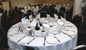 KIng George C, Compass Point Inn, Surrey — Facility Fees and Guarantees 
The Catering Department must be notified of your guaranteed number of Guests, as well as your entree-split count, by 12 o'clock noon, seven business days prior to your event. Once received by the Catering Department, the number will be considered a guarantee and is not subject to deduction.