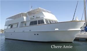 Chere Amie Yacht, Corporate Image Yacht Charters, San Diego — You will be enchanted with the Chere Amie, a comfortable 80 foot yacht popular for weddings, meetings, parties and other private charters for up to 150 guests on San Diego Bay. A full service galley with onboard chef provides 5 star cuisine.
 
Recently refurbished, the yacht features two decks, one a spacious upper dining salon with seating capacity for 100, offering 360 degree panoramic views. The lower deck hosts a spacious bar with granite top, a wood parquet dance floor, and an inviting lounge area for relaxing. Guests can experience the full walk-around deck to enjoy the breezes on the bow or admire the views from the covered outdoor aft veranda. The yacht offers a DJ sound and lighting system and capability for multimedia presentations.