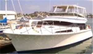 Hululani Yacht, Corporate Image Yacht Charters, San Diego — Experience the yachting lifestyle onboard the 50 foot yacht Hululani, with overnight accommodations for up to 6 passengers and day trips for up to 12 passengers. The yacht has two berths/state rooms with a queen bed in the master and a double with a single bunk above in the second room, perfect for a romantic weekend getaway or private business meeting. The galley includes a large refrigerator and microwave stove with seated dining for eight. Also provided are two ice makers, bar and a high definition DVD player with screen to watch your favorite movies when you’re not fishing or outside on the deck enjoying the sea breeze.