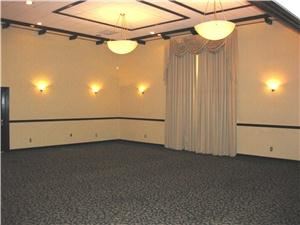 Quality Inn And Suites, Artesia, CA, Artesia — Elegant Banquet Hall with Wood, Ivory and Green earth tones.