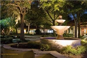 The Courtyard at The Oaks, Melbourne — Beautiful upscale ballroom with outdoor courtyard accommodates up to 200 people and features Chiavari chairs, chandeliers, private bridal suite, granite bar, full kitchen and valet parking.