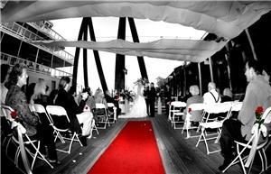 Outdoor Landing, Delta King Hotel, Sacramento — Ceremony out on the Landing patio with white sails covering and a beautiful view of the river - seats up to 250 people.