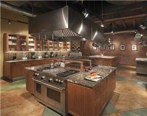 mise en place, Denver — mise en place offers Denver's largest gourmet kitchen with nearly 2000 square feet of kitchen space filled with gourmet residential equipment so you can go home and replicate the experience.  We believe that cooking is more fun when you have the right equipment so we have stocked our kitchen with All-Clad pans, Wusthof knives and Kitchenaid appliances!  Our max capacity is 60 students for a hands-on class but many classes operate with far fewer students for individualized attention!  For demonstrations, we have 2 cameras to focus in on the chef so you can get an up close look at what they are demonstrating on a 42" monitor!    
mise en place offers three 48" stainless steel ranges with gas burners and convection ovens for your cooking pleasure!  We utilize Subzero refrigeration and beautiful granite countertops, as well as two 6' by 6' marble-topped bake islands for rolling doughs and sushi!  You'll step into our kitchen and wish that you could cook in it everyday!