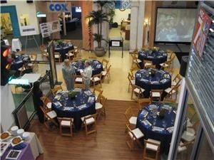 The McGrath Family JA BizTown, Junior Achievement, San Diego — The McGrath Family JA BizTown is an ideal venue for a cocktail reception and/or dinner. Inside JA BizTown, the mini-San Diego city will wow your guests.  This is a one of a kind location to host an event. JA BizTown’s overall dimension is 3556 square feet, accomodating 250-300 guests for a cocktail reception and 150 for a seated dinner.  There is also access to a small catering kitchen downstairs.