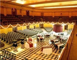 Auditorium, The Spokane Masonic Center, Spokane — The auditorium has a performance seating capacity of 1450. 
The stage is 45 feet wide and 31 feet deep. The gleaming black and white diamond field of the 30 foot wide by 71 foot deep tile floor allows the room to be used for multiple events. The auditorium can accommodate 160 banquet style with a dance floor.