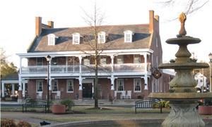 BRICK HOTEL ON THE CIRCLE, Georgetown — Located right on The Circle in historic Georgetown, Delaware, just 15-20 minutes from the busy (and expensive!) beach area and 1 1/2 - 2 hours from Baltimore/Washington/Philadelphia, our 14-room inn & meeting place is within walking distance to all court houses, some antique shops, and small eateries.  The Brick Hotel On The Circle (known by the locals as "The Brick"!), offers an atmosphere of classic and casual elegance!