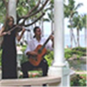 Maui Romantic Classical/Jazz Violin & Guitar Duets, Kihei — Classical/ Jazz Violin & Guitar duet! We have a diverse repertoire of romantic jazz, film & show tunes, classical duets, love songs, wedding music, Celtic tunes, Tangos, Pat Metheny tunes, Andrea Bocelli, Beatles & Coldplay songs. Brazilian Bossa Nova & Choros for an exotic, tropical island feel. Enhance your celebration! Solo or ensemble also available. 808-283-6945 See Makena beach music video on our website: www.MauiWeddingMusic.com